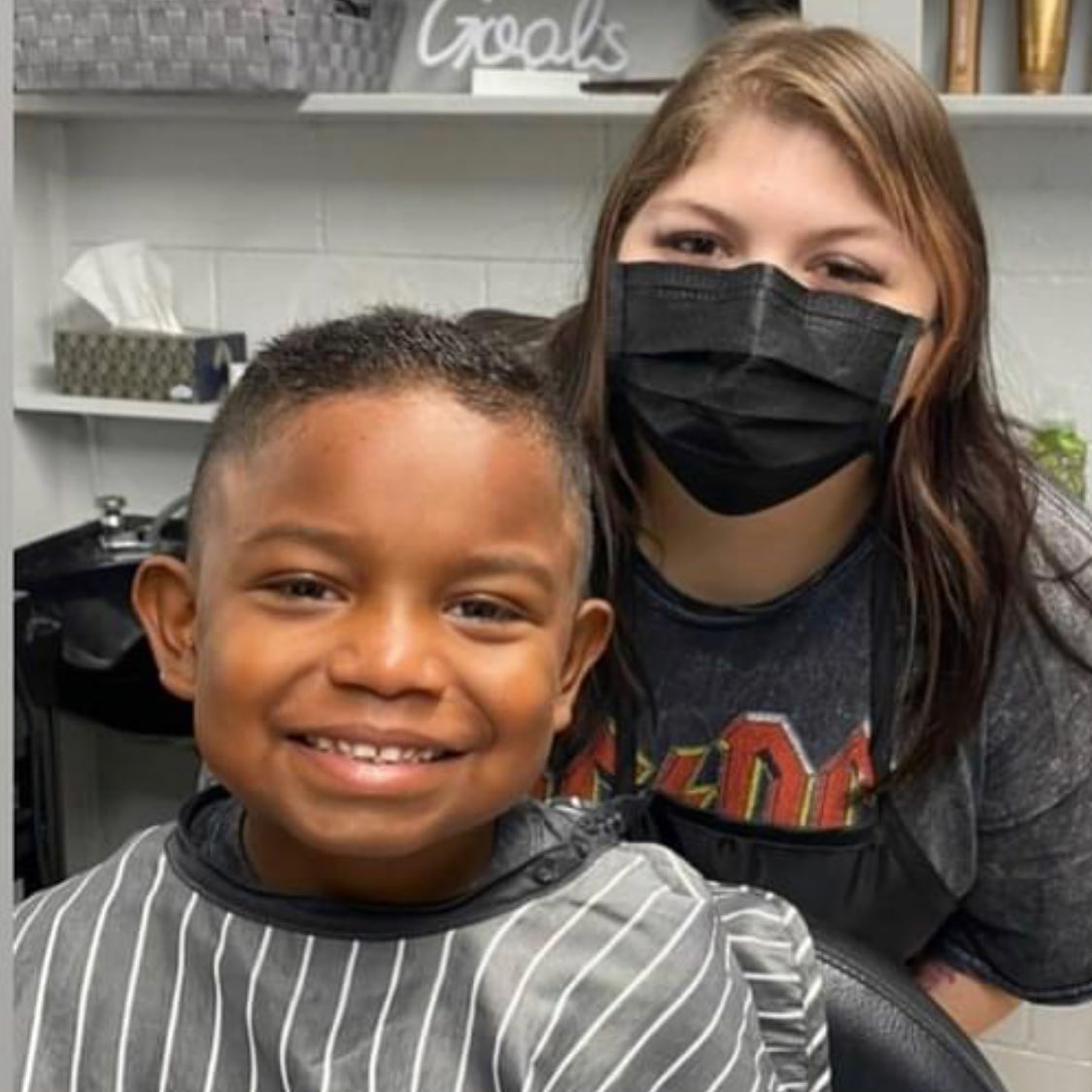 Happy young client after a fresh cut